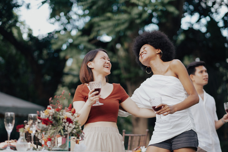 Guests laughing together at a celebration